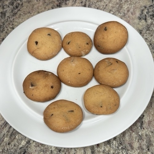 Chocolate chip cookies on a white plate